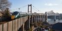 GWR train travelling over a bridge