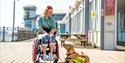 woman in wheelchair at The Grand Pier