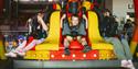 Children enjoying one of the rides at The Grand Pier