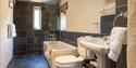 Bathroom showing the wet room style shower and handles at Asheston Eco Barns