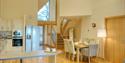 Breakfast bar and dining table in the kitchen at Homelands Trust