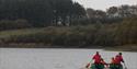 Couple kayaking around the water at Calvert Exmoor