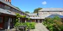 The outside seating area with tables and chairs at Calvert Exmoor