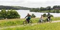 Family enjoying a bike ride at Staunton Harold