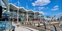 Gunwharf Quays Shopping Centre with a background of blue sky