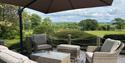 Outdoor seating area with countryside views