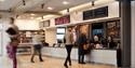 People buying tickets from the box office at Sadler’s Wells