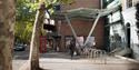 The entry to Sadler’s Wells Theatre with bike racks in the forefront