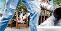 Children playing on the slides at the playpark at Clarks Village