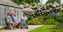 Visitors enjoying the gardens at Calke Abbey