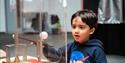 child with display at Winchester Science Centre and Planetarium