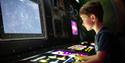 children using arcade machines