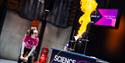A person demonstrating a fire experiment at Winchester Science Centre and Planetarium