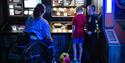 guest in wheelchair looking at displays at Winchester Science Centre and Planetarium