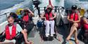 boat trip with guests in wheelchairs with Wetwheels Jersey