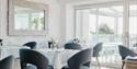 tables set ready for diners at Sumas Restaurant