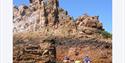 people kayaking around Jersey's rock formations with Jersey Kayak Adventures Ltd
