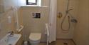Beamsley Project's wet room with grab rails, toilet and walk in shower