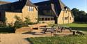 Beamsley Project's outdoor area, with benches dotted