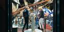 Couple looking down at the exhibits from a balcony at Jersey Heritage Maritime Museum