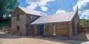 Outside one of the properties at North Hayne Farm Cottages