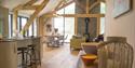 breakfast bar and living area at North Hayne Farm Cottages