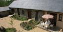 North Hayne Farm Cottages from above showing a seating area