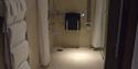accessible bathroom with shower seat at Rudding Park