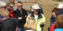 group and a guide getting ready to do a walk along the beach with Jersey Walk Adventures