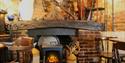 Cosy fire place and historic décor at The Waterloo Arms in the New Forest