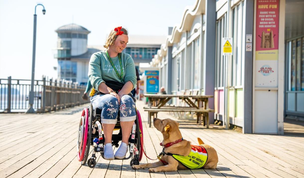 woman in wheelchair at The Grand Pier