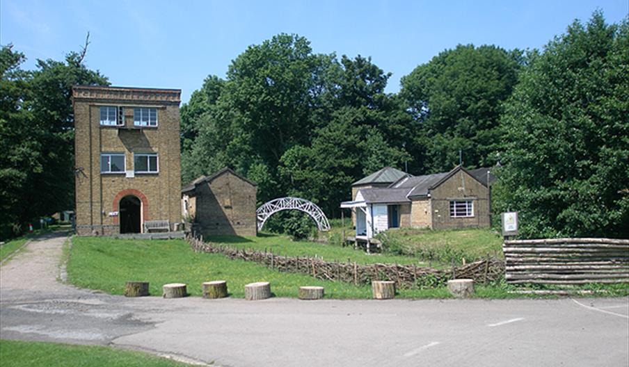 Wildlife Tower, footbridge and canal-side building at the Royal Gunpowder Mills Waltham Abbey.