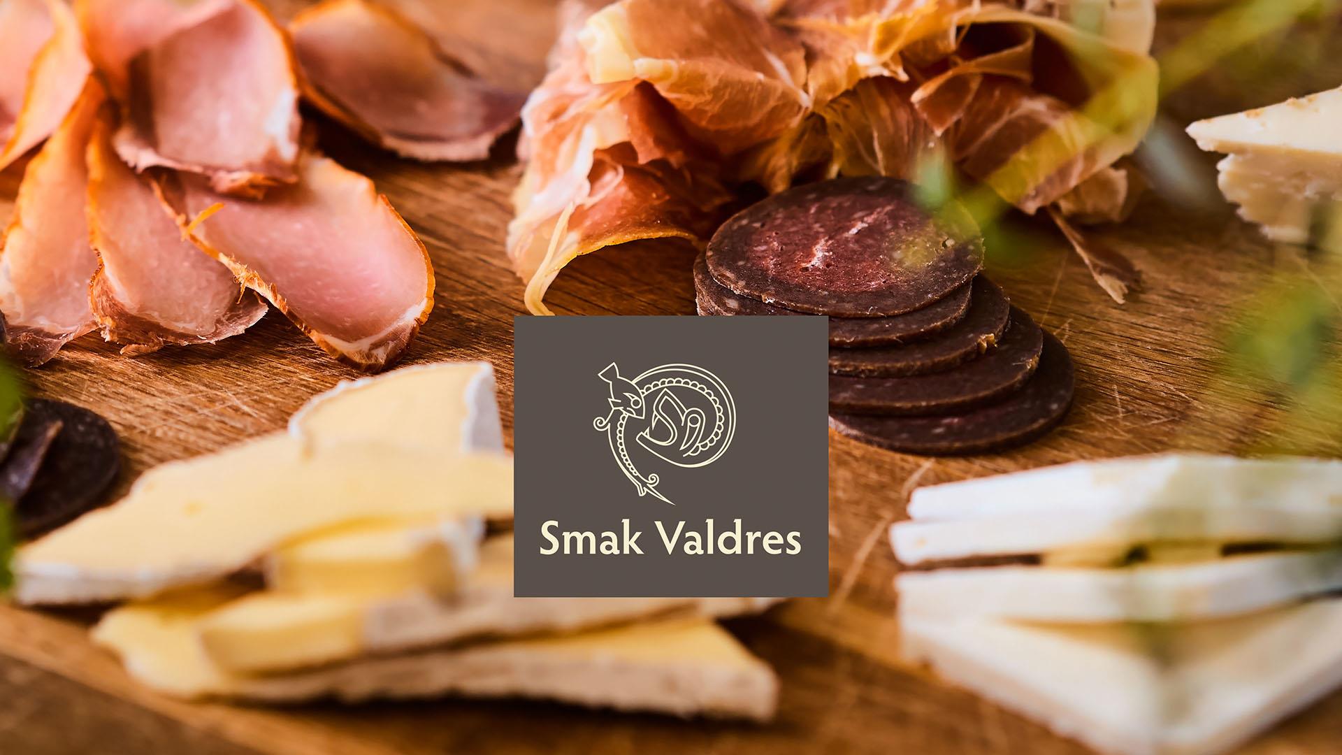 Spekemat og ost med Smak Valdres logo