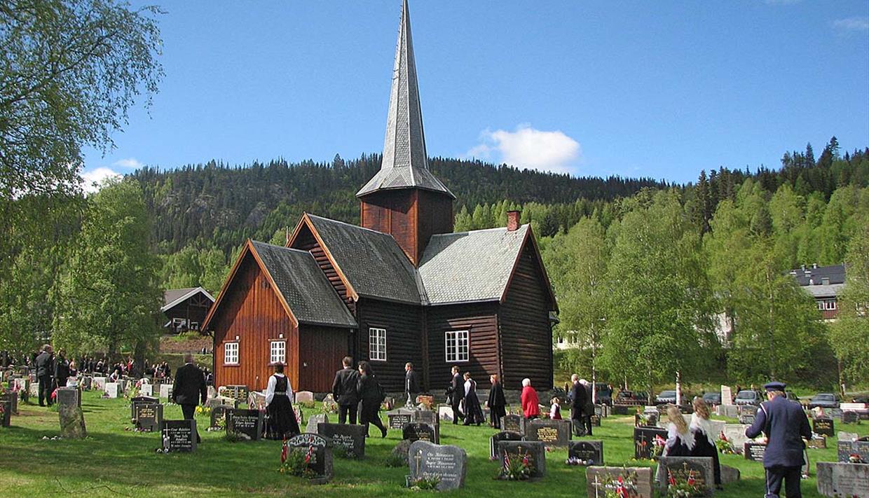 Wooden church with graveyard