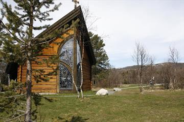 The Chapel of Lights (Lyskapellet) at Beitostølen with its beautiful glass mosaic seen from the outside during summer.