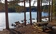 Rest area with benches on the shore of Lake Fløafjorden.