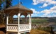 White wooden pavillion on a viewpoint overlooking Fagernes