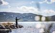 Fishing from the shore of Lake Vinstre.