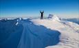 On the summnit of Austre Kalvehøgde with skis.