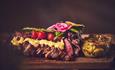 Beautifully plated meat with garnishes