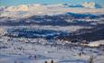 Storslått utsikt mot Jotunheimens totusenmetertoppene fra skisenteret på Vaset.