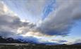 Mountain plateau with lakes and high skies with lots of cool clouds and magical light