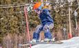 A child in a jump on skis at Valdres Alpinsenter in Aurdal.