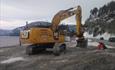 Gravemaskin i arbeid