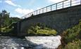 The Kjærlighetsstien cycling route crosses River Tisleia on Ormhamar Bridge naer Vasetdansen.