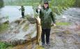 Fisherman with large pike on the hook