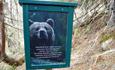 Along the Rugg trail, there are boards with quotes from Fønhus' novel "Der vildmarka suser".