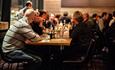 People enjoying food and drinks inside Lodge 900