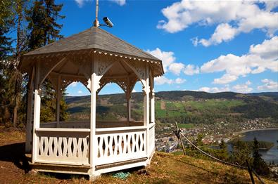 White wooden pavillion on a viewpoint overlooking Fagernes