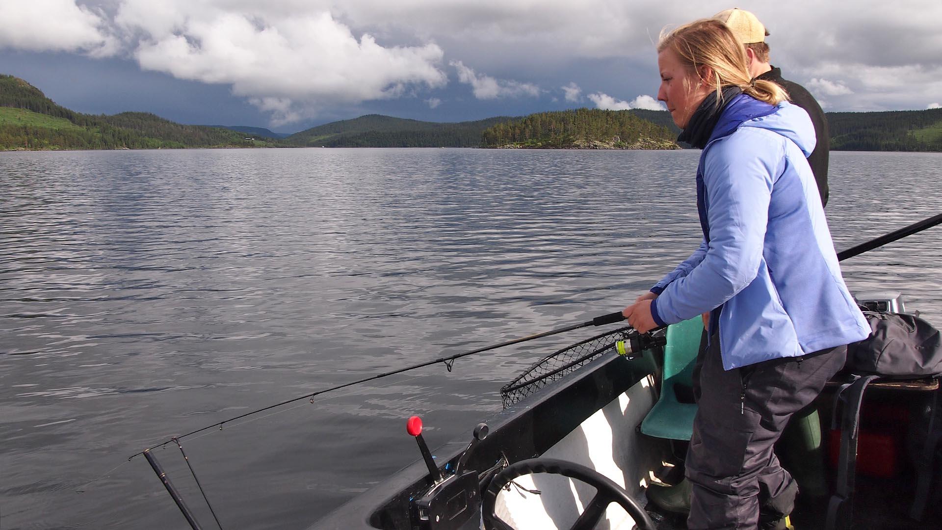 Fishing from boat on lake Øyangen